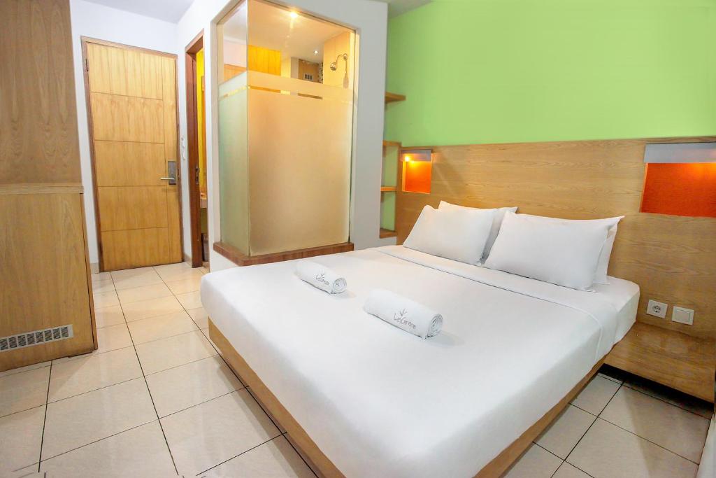 Двухместный (Стандартный двухместный номер с 1 кроватью) гостевого дома LeGreen Suite Poso, Джакарта