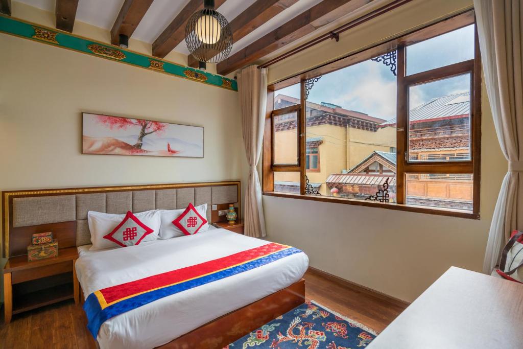 Двухместный (Улучшенный номер с кроватью размера «queen-size») гостевого дома Bodhi Boutique Inn, Шангри-Ла (Тибет)