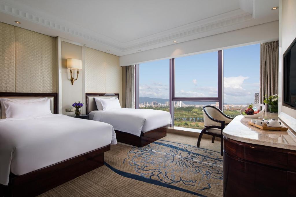 Двухместный (Двухместный номер Делюкс с 2 отдельными кроватями и видом на реку) отеля Kasion International Hotel Yiwu, Иу