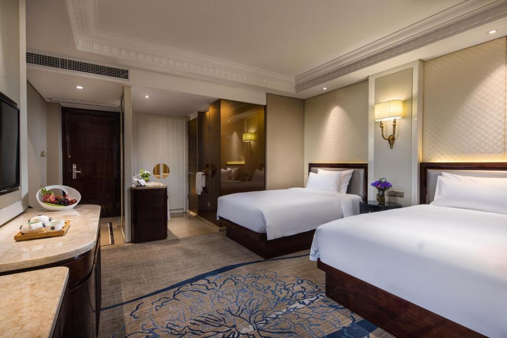 Двухместный (Двухместный номер Делюкс с 2 отдельными кроватями) отеля Kasion International Hotel Yiwu, Иу
