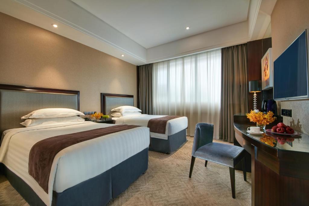Двухместный (Двухместный номер с 2 отдельными кроватями) отеля Shanghai New Century Manju Hotel Luoshan @SNIEC, Шанхай