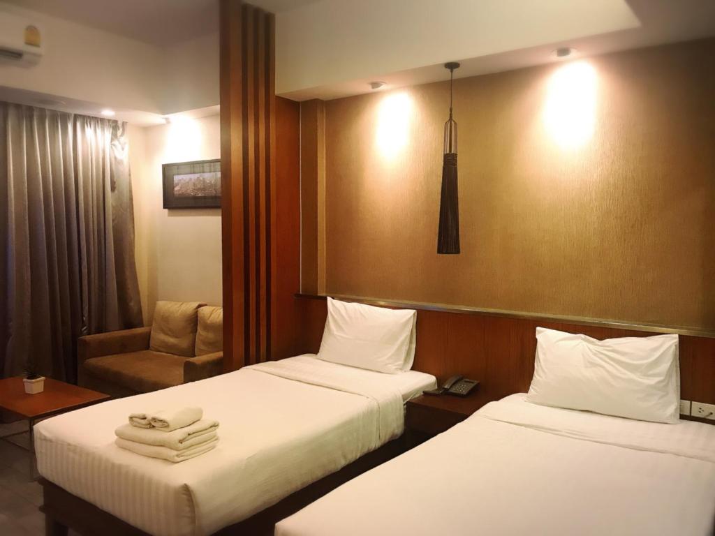 Двухместный (Двухместный номер «Гранд» Делюкс с 2 отдельными кроватями) отеля Inn Residence Serviced Suites, Паттайя