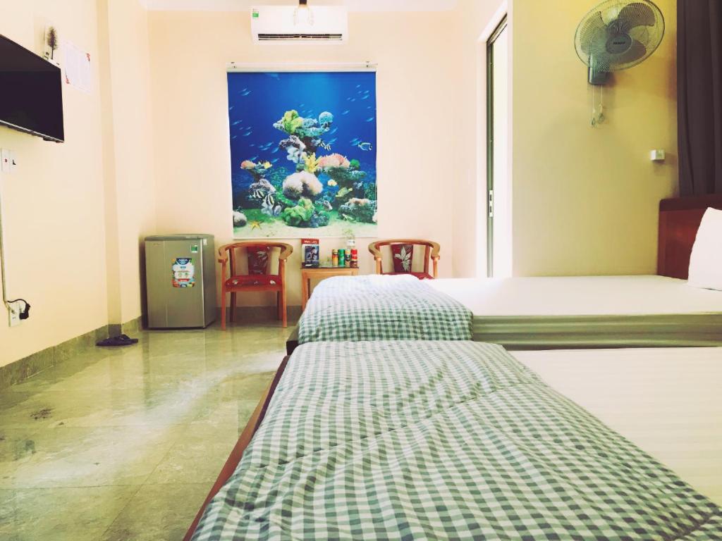 Двухместный (Улучшенный двухместный номер с 2 отдельными кроватями и видом на город) отеля Nhat Mai Hotel, Катба