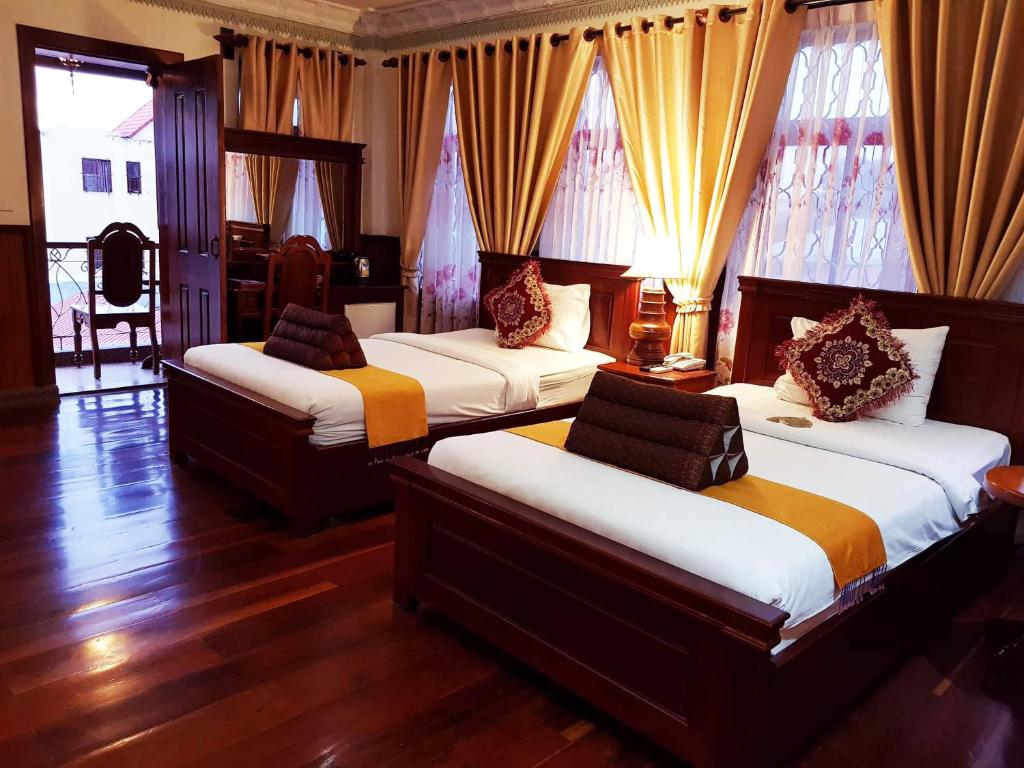 Двухместный (Улучшенный двухместный номер с 2 отдельными кроватями) отеля Okay Boutique Hotel, Пномпень