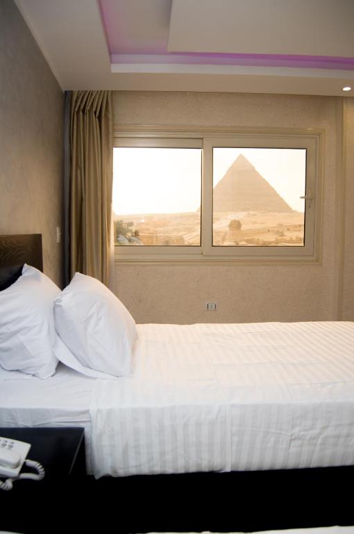 Одноместный (Одноместный номер с видом на пирамиду) отеля Egypt pyramids inn, Каир