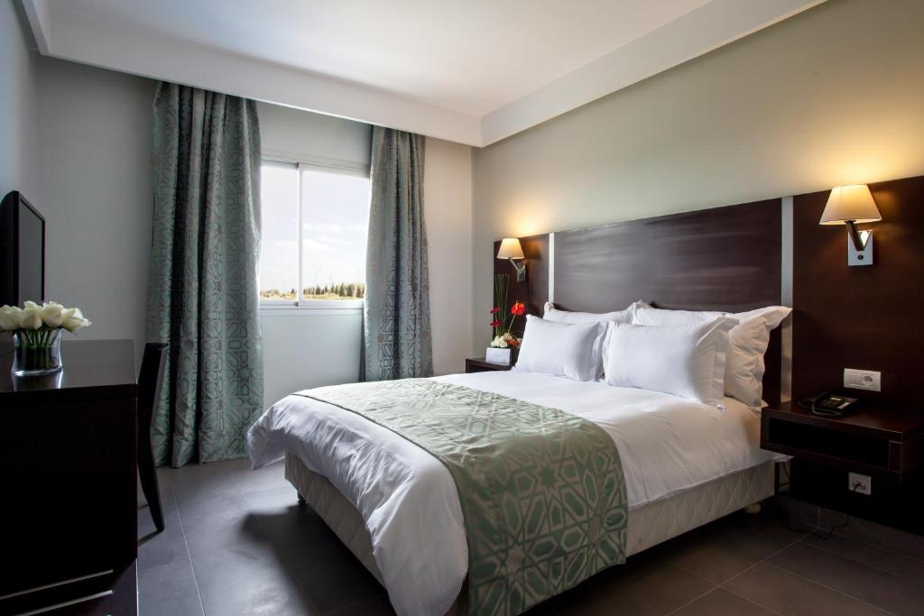 Двухместный (Улучшенный двухместный номер с 1 кроватью и видом на сад) отеля Atlas Sky Airport, Касабланка