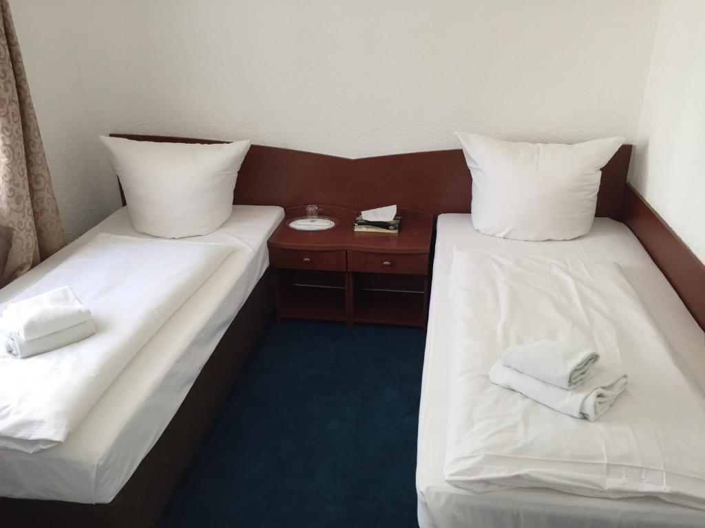 Двухместный (Стандартный двухместный номер с 2 отдельными кроватями) отеля Hotel Aurelia, Франкфурт-на-Майне