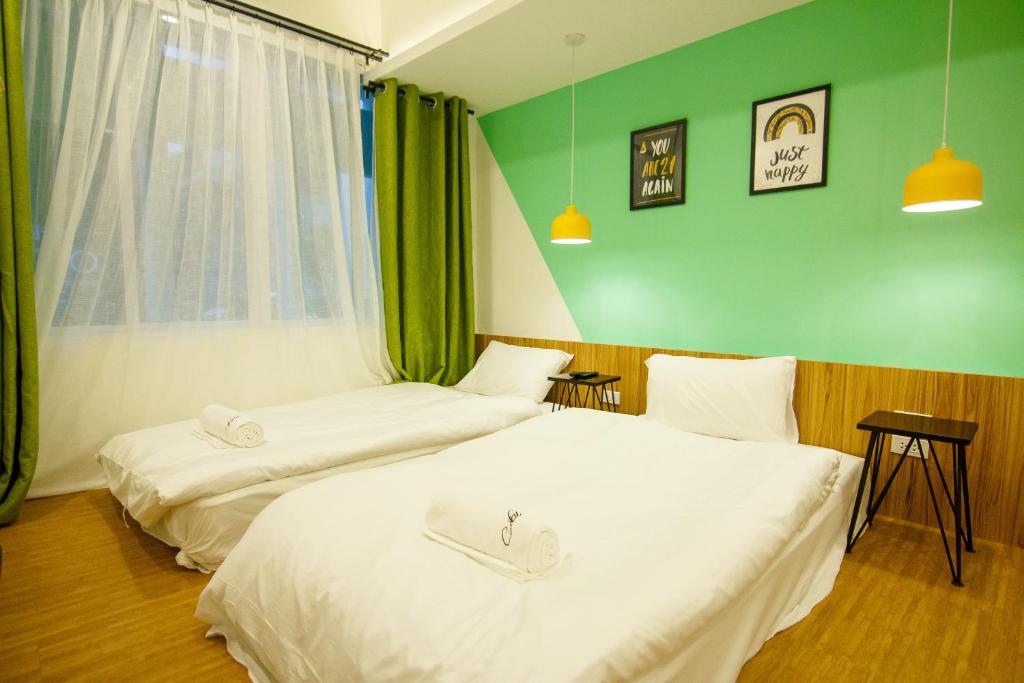 Двухместный (Стандартный двухместный номер с 2 отдельными кроватями и общей ванной комнатой) хостела Folk Poshtel Asok, Бангкок