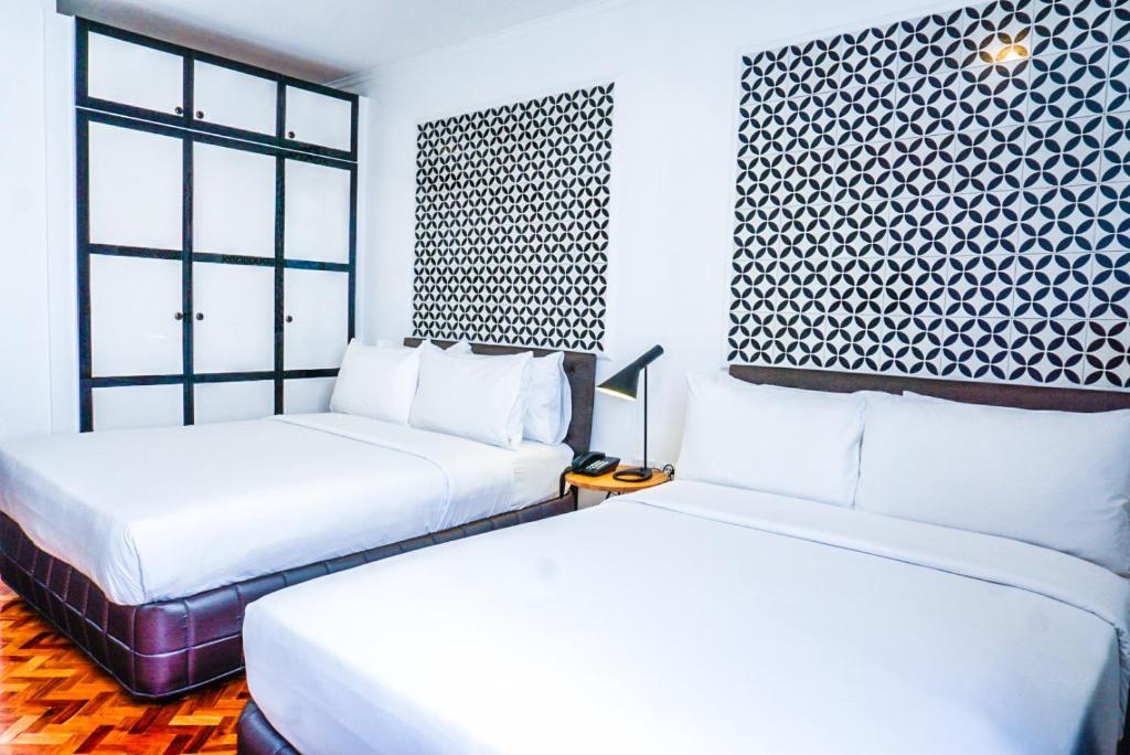 Семейный (Two Bedroom Premium Family) отеля Parque España Residence Hotel Managed by HII, Манила