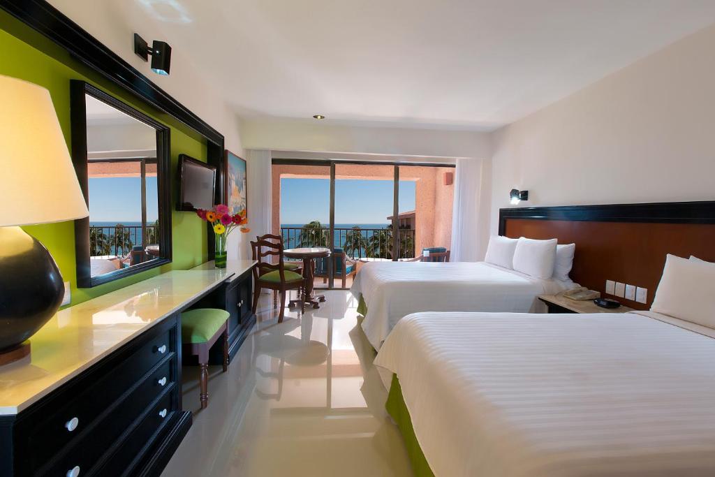 Двухместный (Deluxe Premium Level Ocean Front (1 Adult + 1 child)) курортного отеля Barceló Huatulco, Танголунда