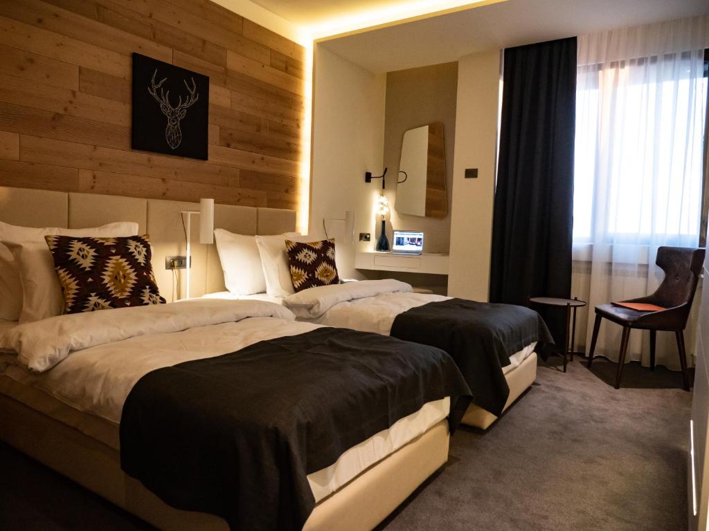 Двухместный (Специальное предложение - Двухместный номер с 2 отдельными кроватями и пакетом услуг «Идеальный отдых») отеля Hotel Putnik Kopaonik, Копаоник