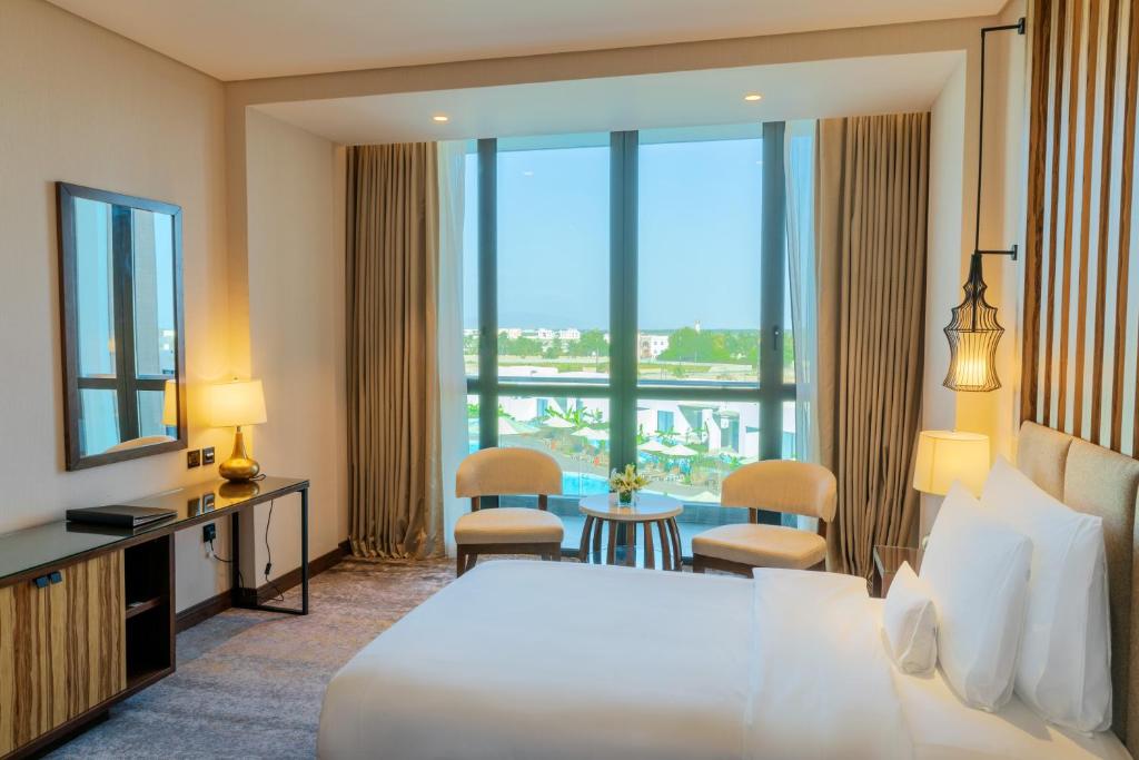 Двухместный (Двухместный номер «Премиум» с 2 отдельными кроватями) отеля Millennium Resort Salalah, Салала