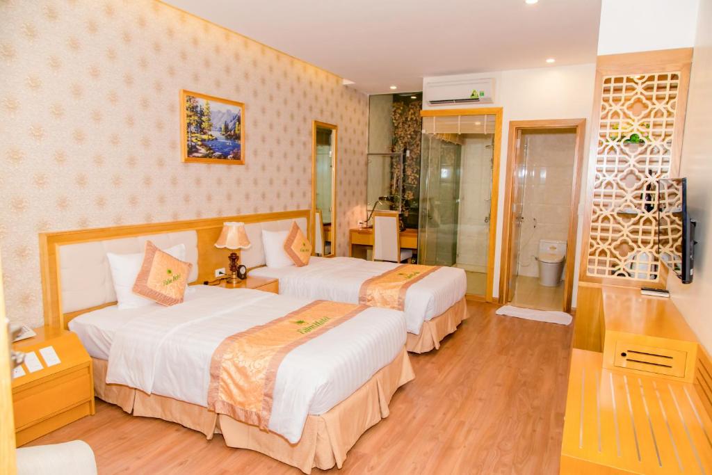 Двухместный (Двухместный номер Делюкс с 2 отдельными кроватями) отеля Palm Hotel Thanh Hoa, Тхань Хоа