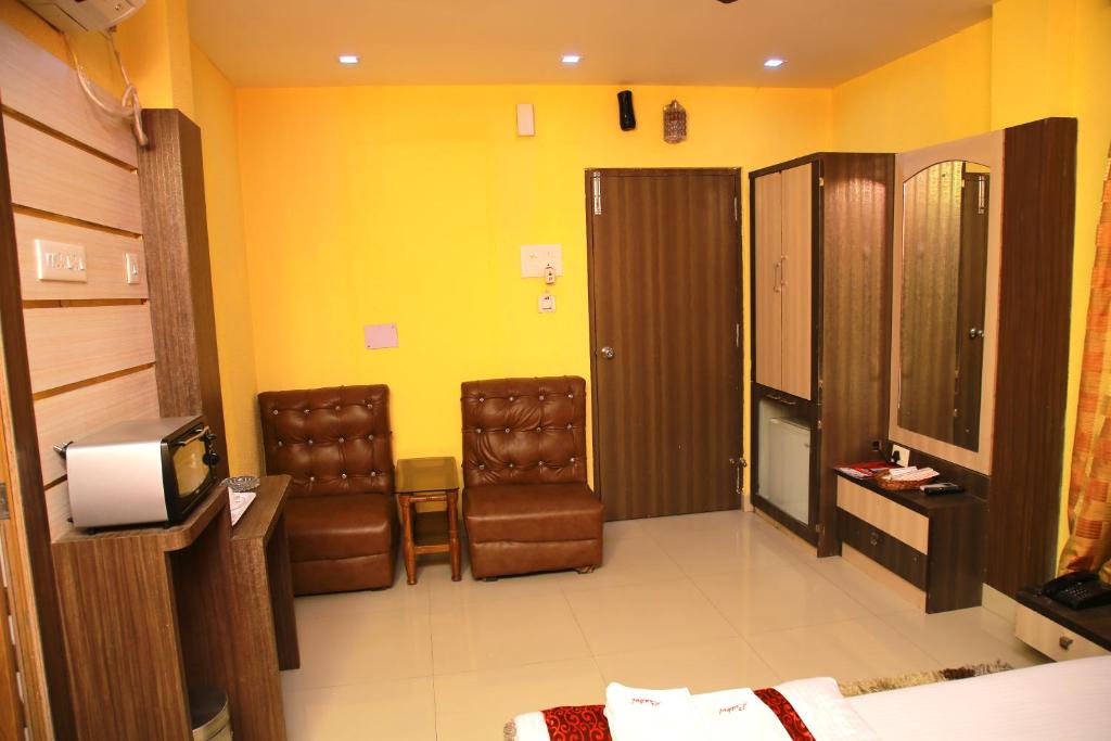 Трехместный (Роскошный трехместный номер) отеля Babul Hotel, Калькутта