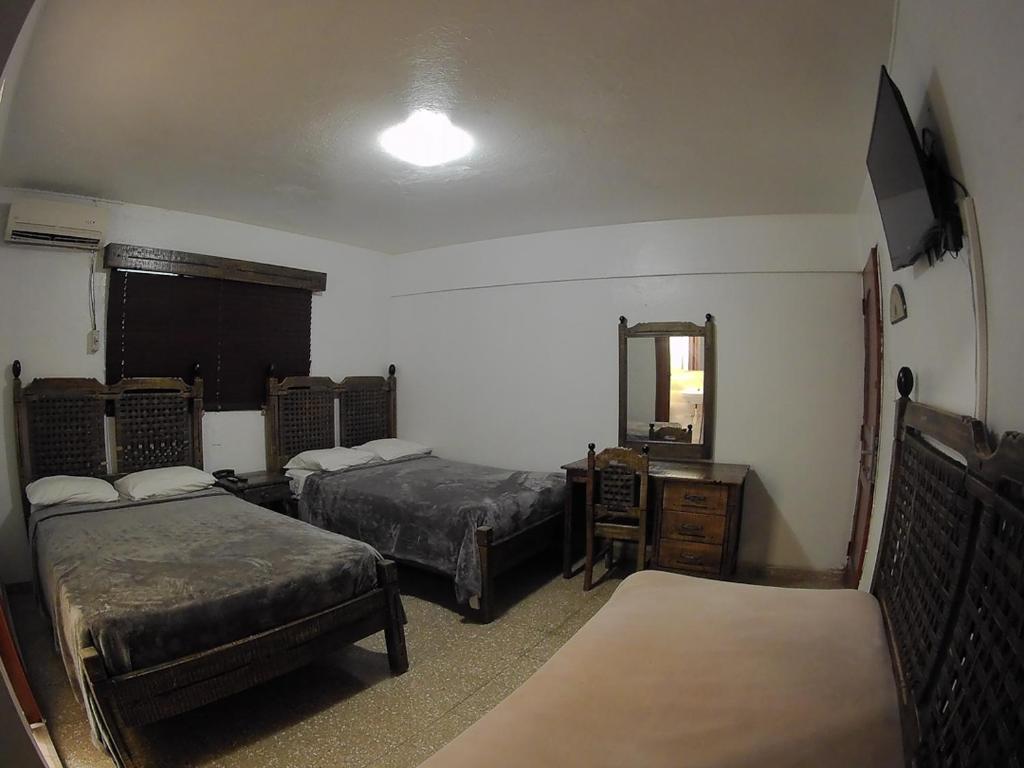 Двухместный (Двухместный номер с 2 отдельными кроватями) отеля Hotel Maison Gautreaux, Санто-Доминго