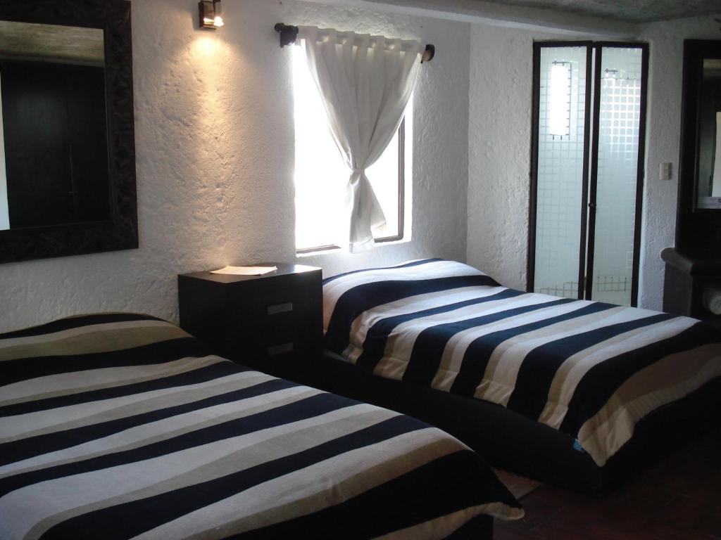 Двухместный (Двухместный номер с 2 двуспальными кроватями) отеля Casa Blanca San Miguel, Сан-Мигель-де-Альенде