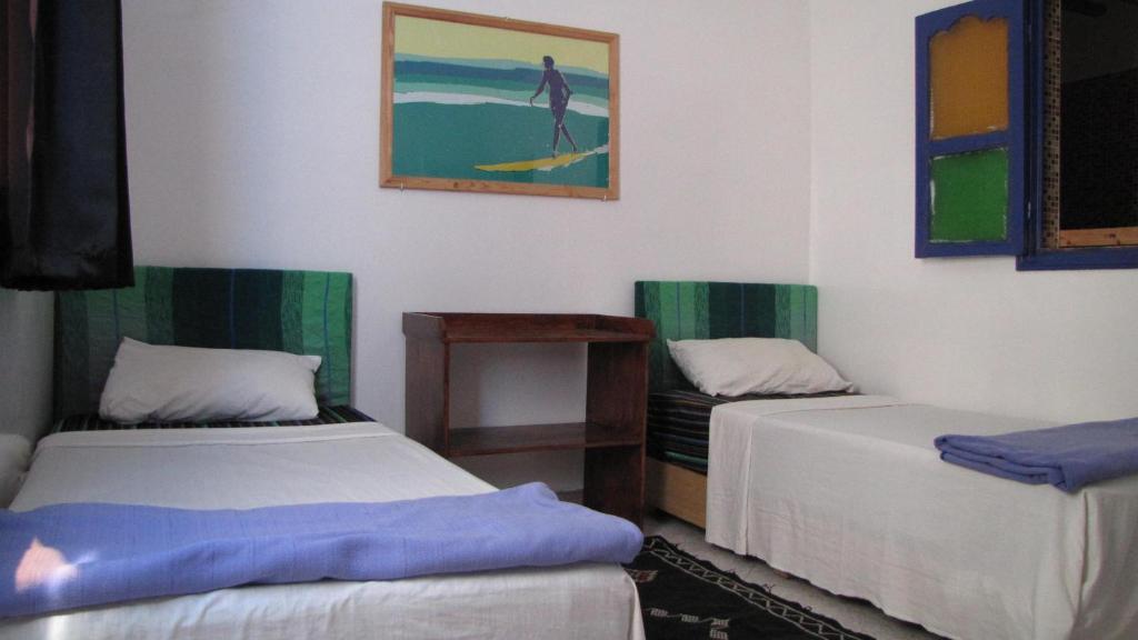 Двухместный (Стандартный двухместный номер с 2 отдельными кроватями) отеля Surf & Travel Hostel, Тагазут