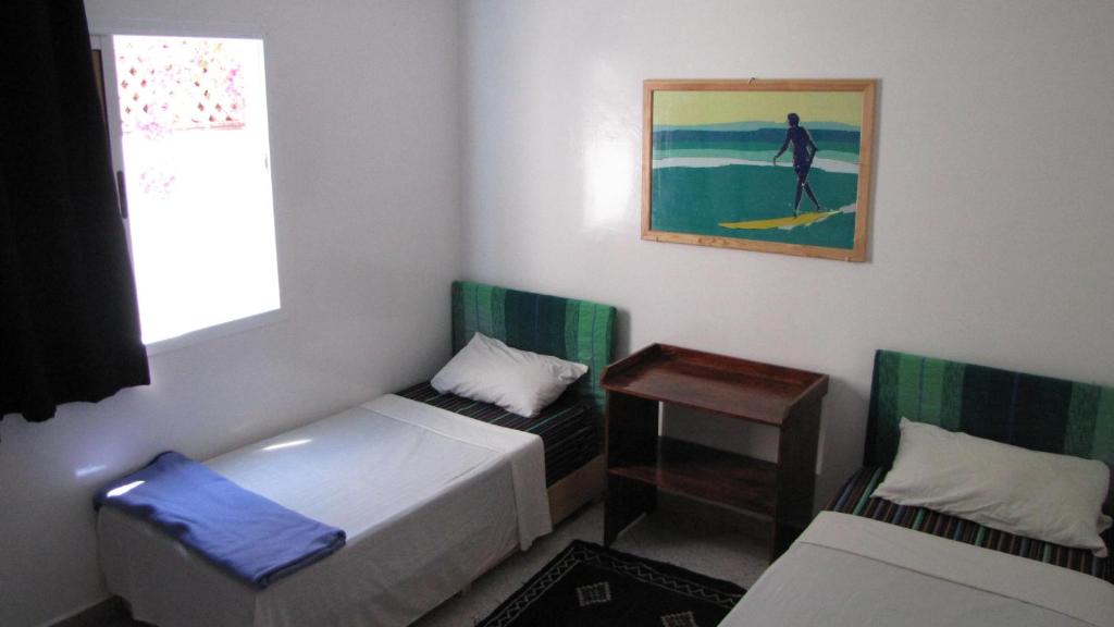 Двухместный (Стандартный двухместный номер с 2 отдельными кроватями) отеля Surf & Travel Hostel, Тагазут
