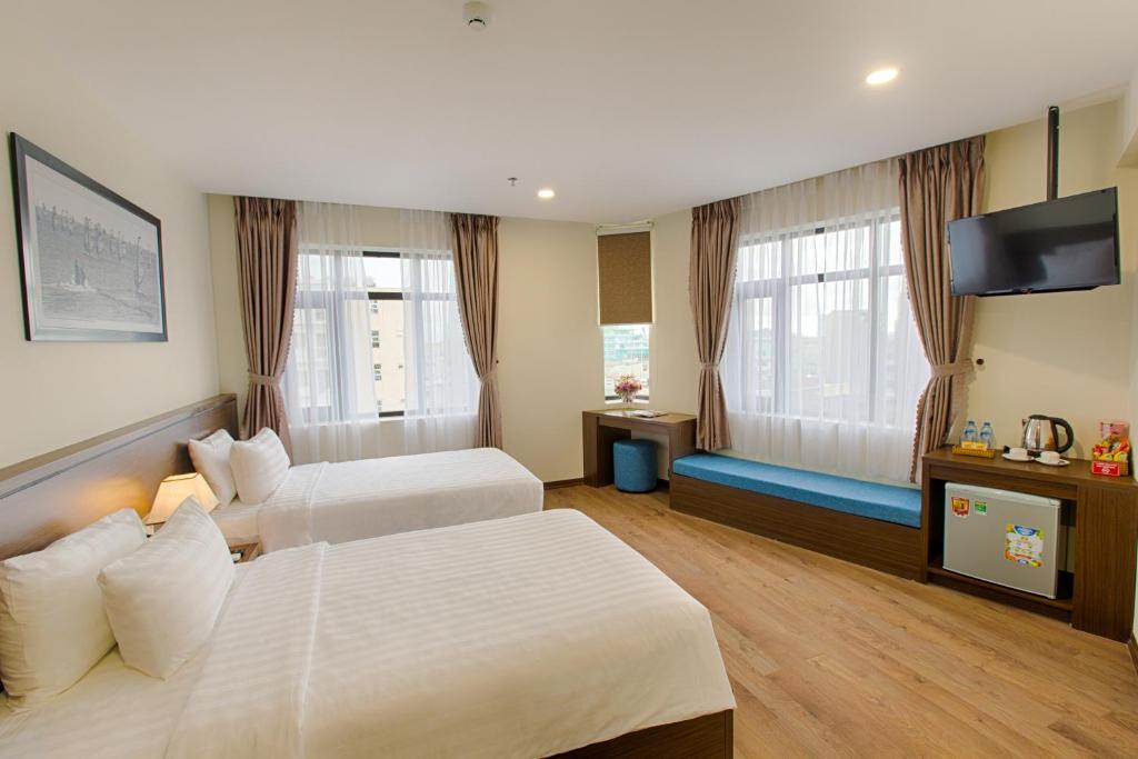 Двухместный (Двухместный номер Делюкс с 2 отдельными кроватями) отеля Central Hotel & Spa, Дананг