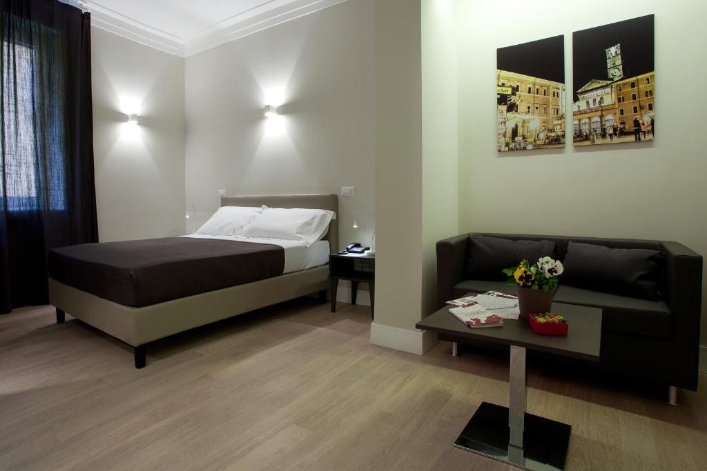 Двухместный (Улучшенный двухместный номер с 1 кроватью) отеля Regola Suite, Рим