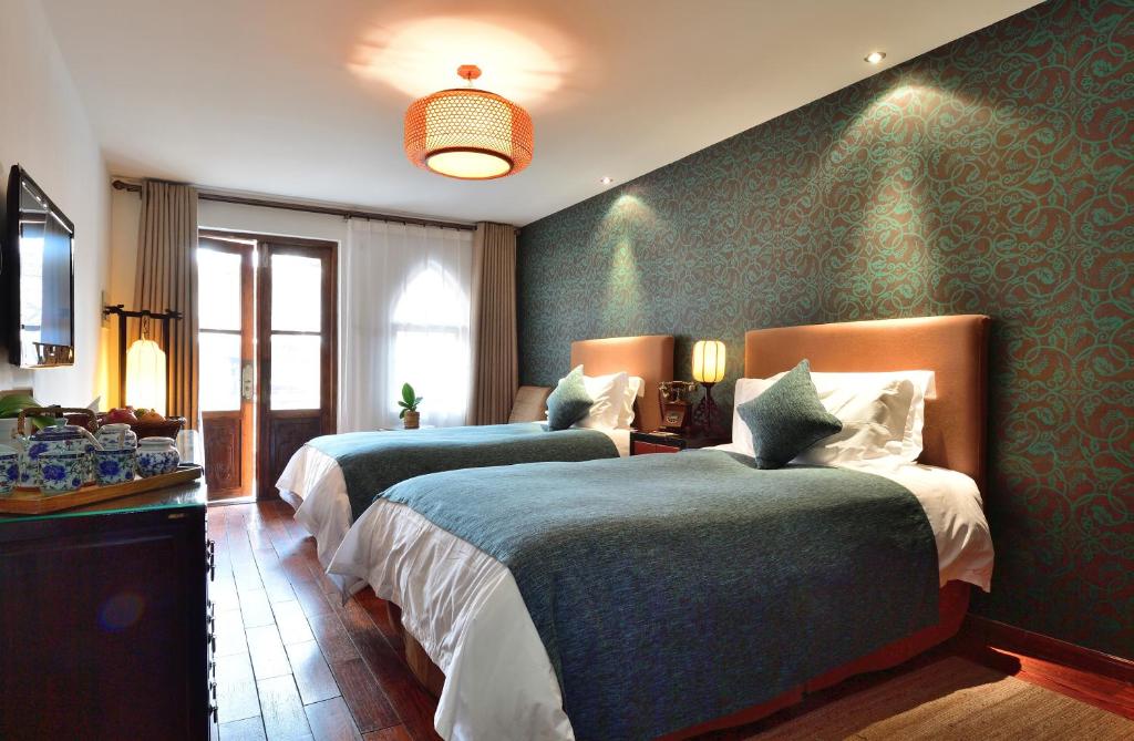 Двухместный (Двухместный номер с 2 отдельными кроватями, вид во внутренний двор) отеля Jingshan Garden Hotel, Пекин