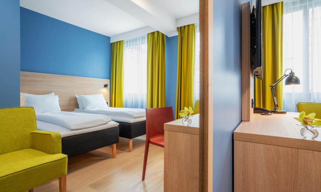 Двухместный (Стандартный двухместный номер с 2 отдельными кроватями) отеля Thon Hotel Astoria, Осло