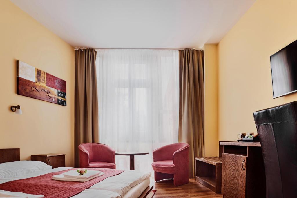 Двухместный (Двухместный номер с 1 кроватью или 2 отдельными кроватями) отеля Hotel Banderium, Комарно