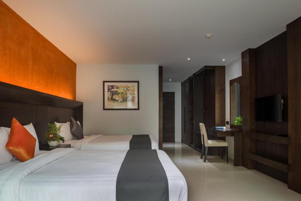 Двухместный (Двухместный номер Делюкс с 1 кроватью или 2 отдельными кроватями, доступ к бассейну) отеля Baan Maksong Resort & Spa, Пхукет