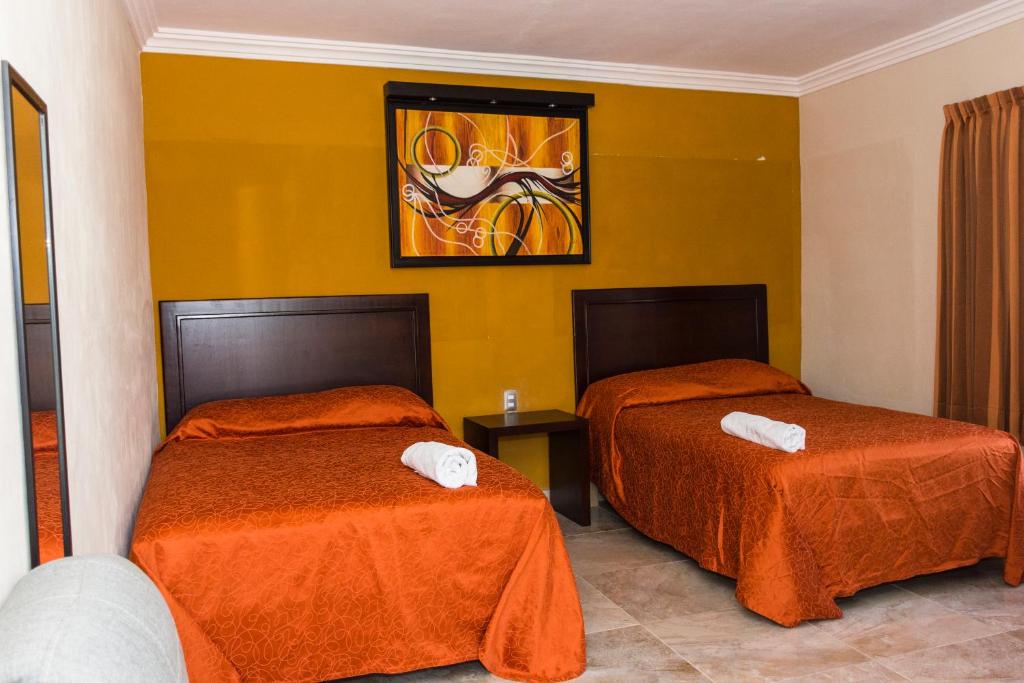 Двухместный (Двухместный номер с 2 отдельными кроватями и видом на бассейн) отеля Terracota Corner Rooms, Кампече