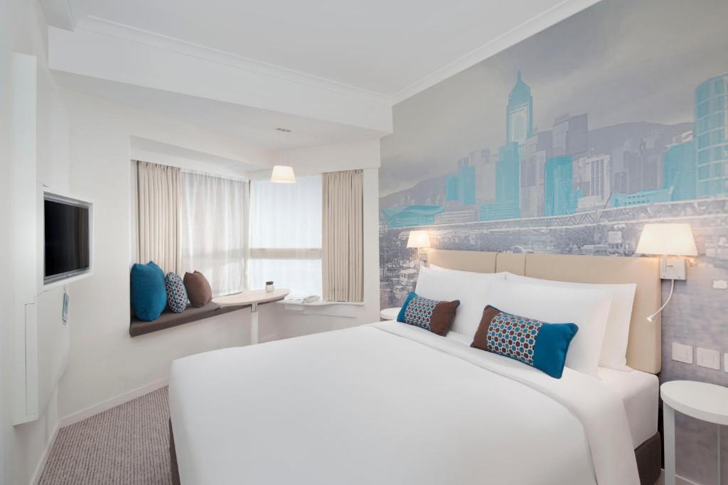 Двухместный (Улучшенный номер с кроватью размера «king-size») отеля Ozo Wesley Hong Kong, Гонконг (город)