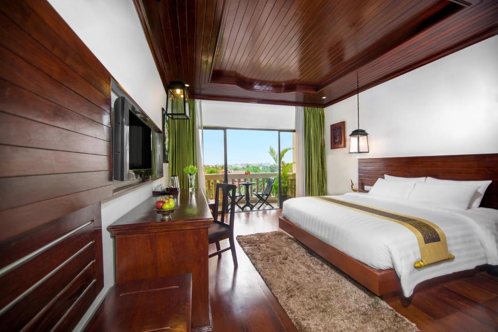 Двухместный (Двухместный номер Делюкс с 1 кроватью или 2 отдельными кроватями - Трансфер от и до аэропорта) отеля Borei Angkor Resort & Spa, Сием Рип