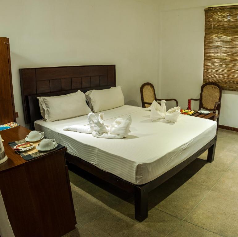 Двухместный (Бюджетный двухместный номер с 1 кроватью или 2 отдельными кроватями) курортного отеля Camellia Resort and Spa, Сигирия