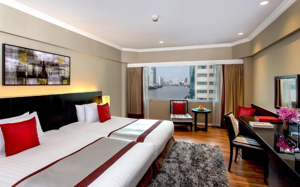 Двухместный (Двухместный номер Делюкс с 2 отдельными кроватями и видом на реку) отеля Ramada Plaza Bangkok Menam Riverside, Бангкок
