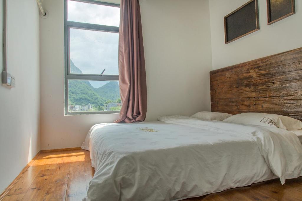 Двухместный (Двухместный номер с 1 кроватью, без балкона) хостела Mountain Stream Inn Yangshuo, Яншо
