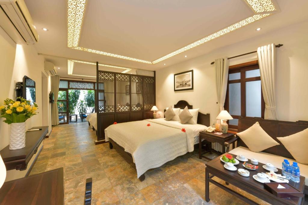 Семейный (Семейный номер) курортного отеля Hoi An Ancient House Resort & Spa, Хойан