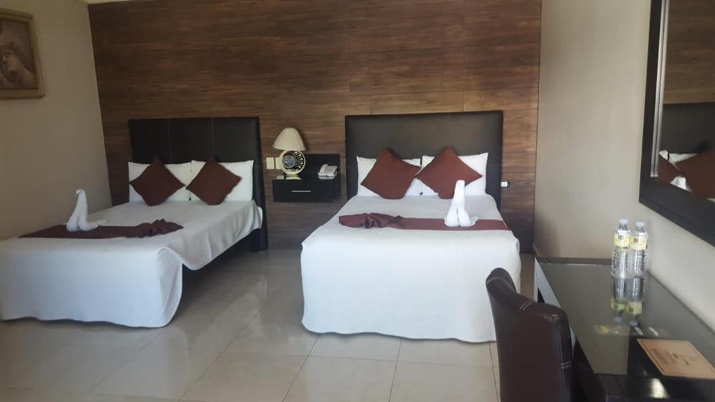 Двухместный (Двухместный номер с 2 отдельными кроватями) отеля Hotel Gya Boutique, Агуаскальентес