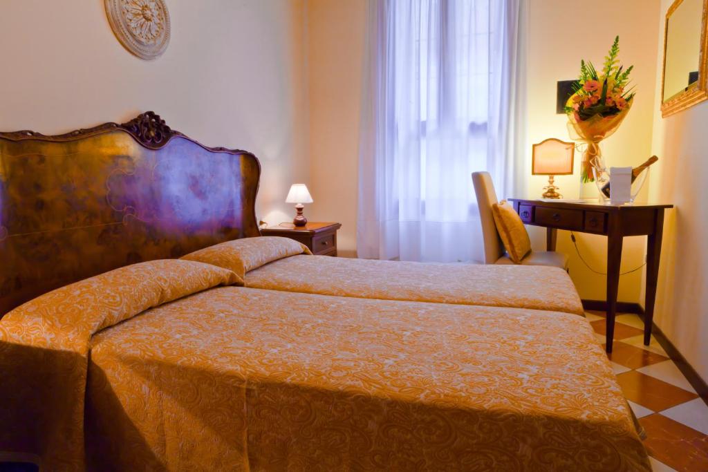 Двухместный (Двухместный номер с 2 отдельными кроватями) отеля Hotel Henry, Венеция