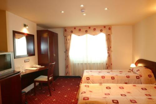 Двухместный (Двухместный номер с 2 отдельными кроватями) отеля Martin Club Hotel, Банско