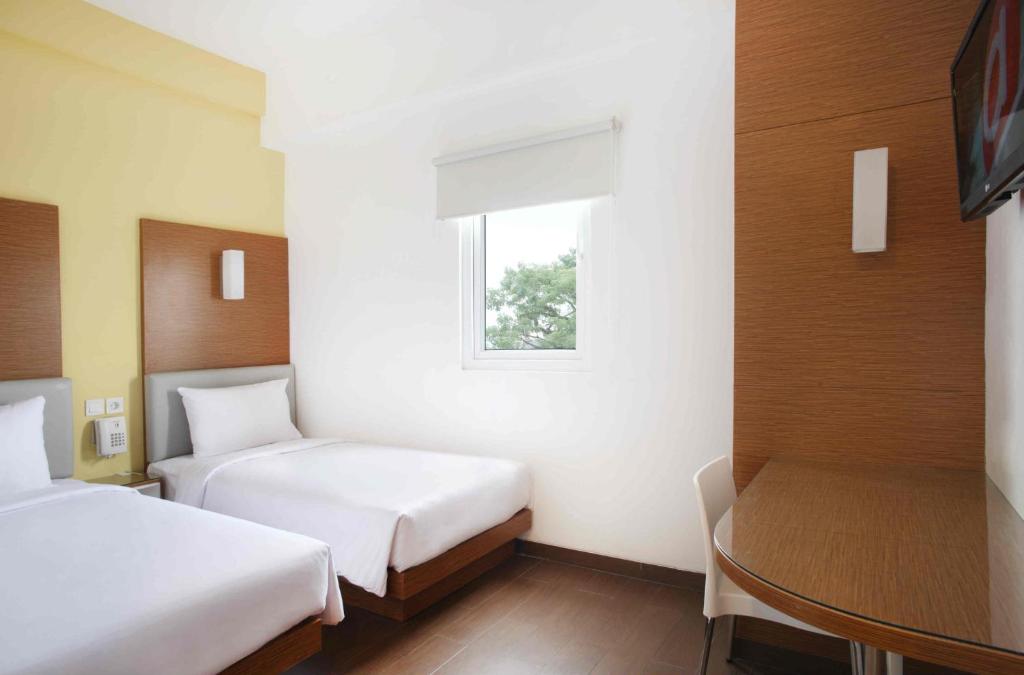 Двухместный (Двухместный номер «Смарт» с 2 отдельными кроватями) отеля Amaris Hotel Pratama Nusa Dua, Нуса Дуа