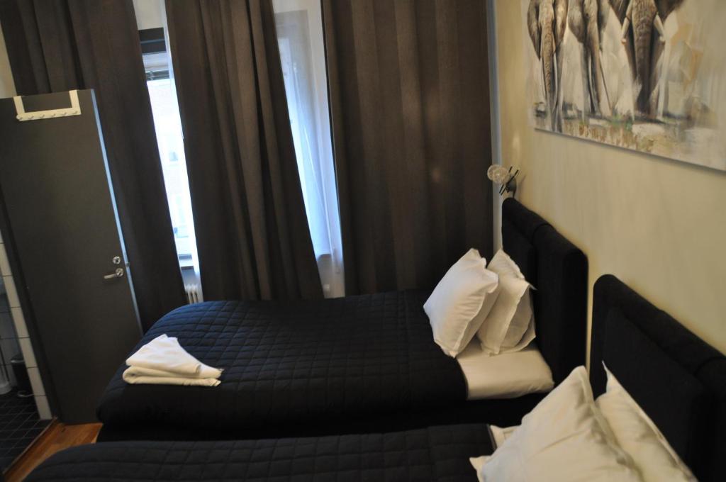 Двухместный (Двухместный номер с 2 отдельными кроватями) гостевого дома Hotel Kungsbacken, Катринехольм