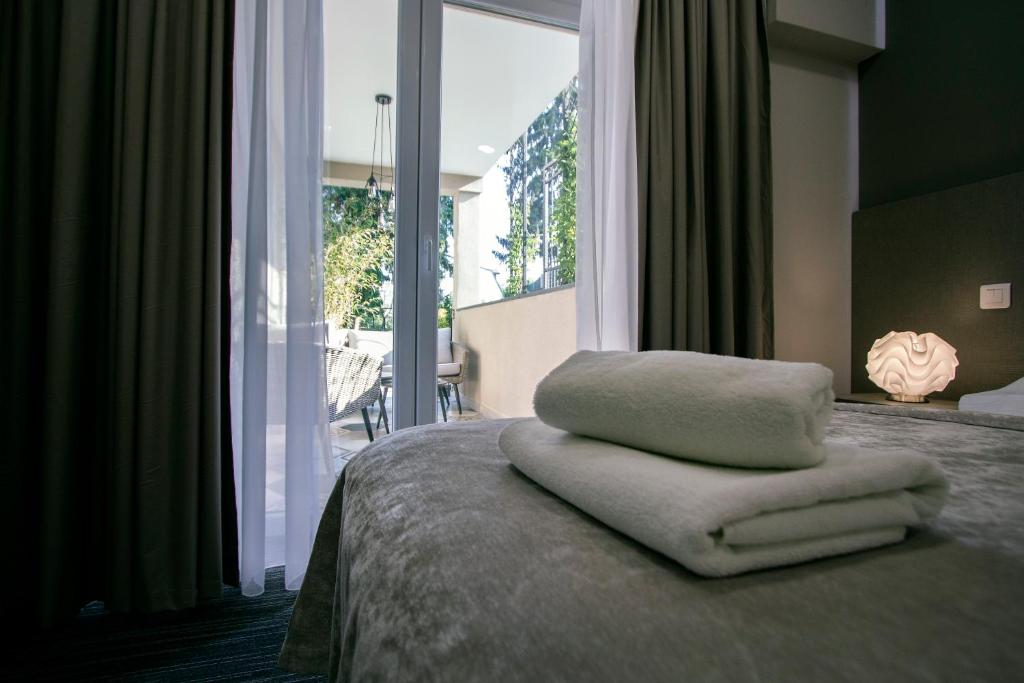 Двухместный (Двухместный номер с 1 кроватью, дополнительной кроватью и террасой) отеля Sundial Garden Rooms, Загреб