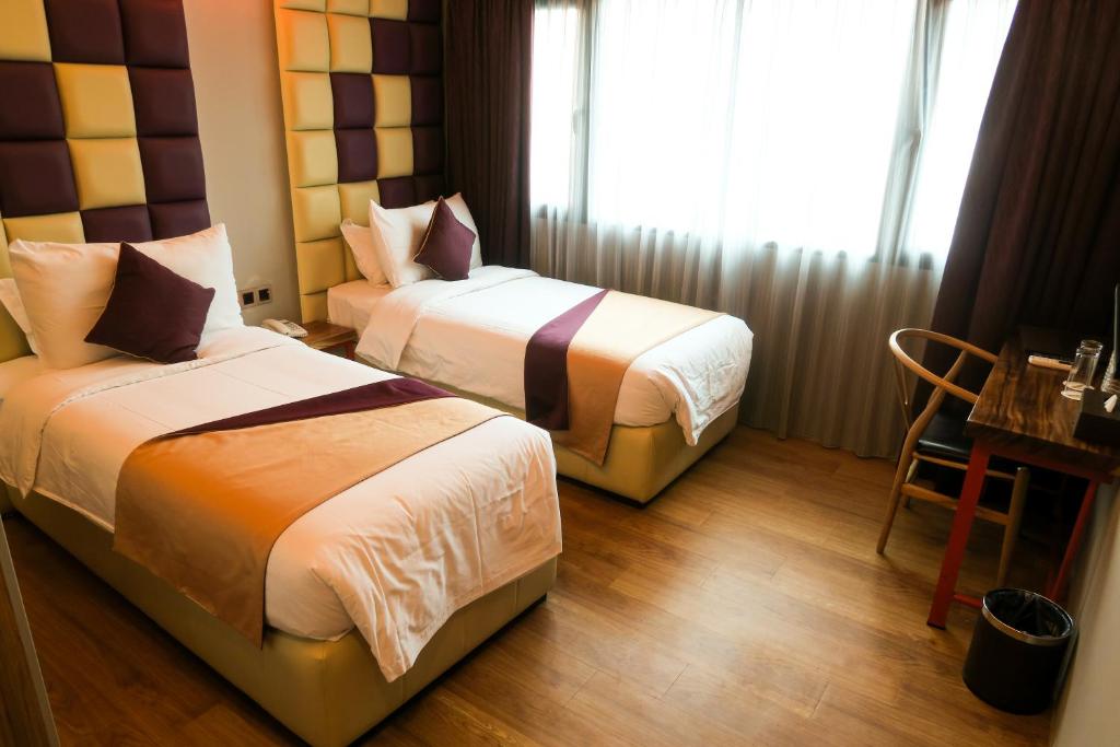 Двухместный (Улучшенный двухместный номер с 2 отдельными кроватями) отеля Le Dream Boutique Hotel, Джорджтаун
