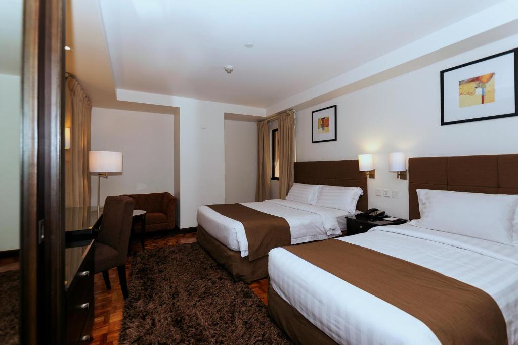 Двухместный (Двухместный номер Делюкс с 2 отдельными кроватями) отеля City Garden Hotel Makati, Манила