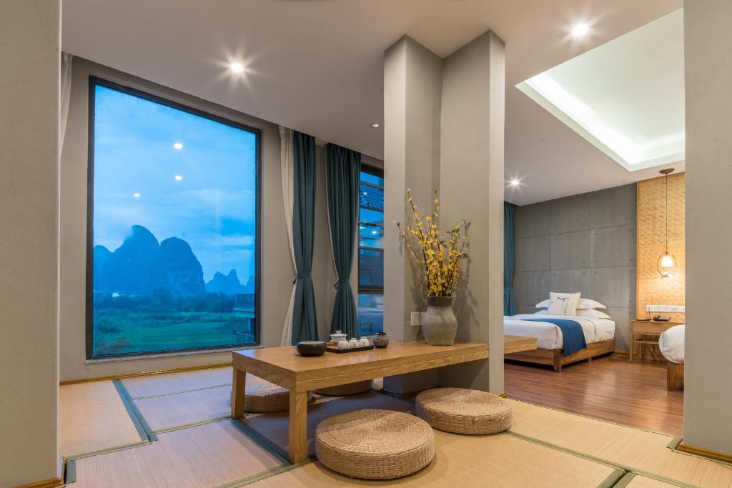 Семейный (Family Room with Tatami Area free afternoon tea available), Yangshuo Zen Garden Resort