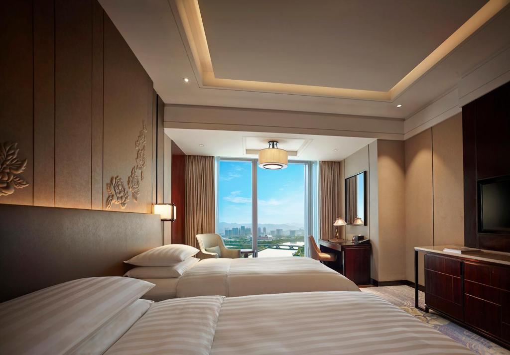 Двухместный (Двухместный номер Делюкс с 2 отдельными кроватями) отеля Shangri-La Hotel, Yiwu, Иу