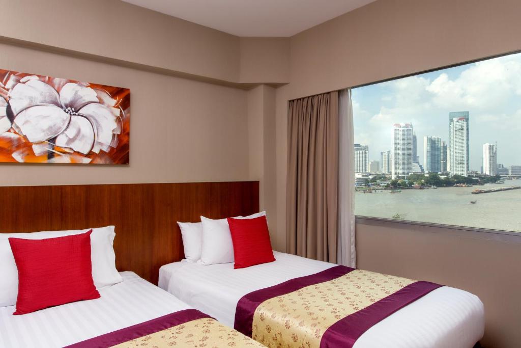 Трехместный (Трехместный номер Делюкс с видом на реку), Отель Ramada Plaza Bangkok Menam Riverside