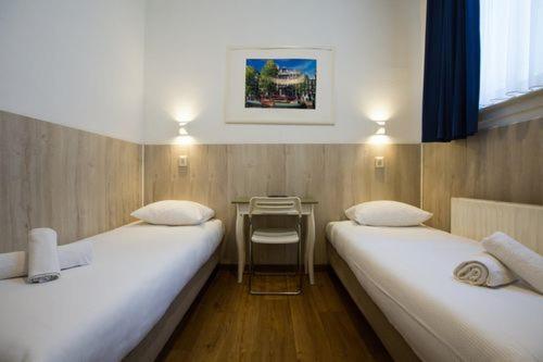 Двухместный (Небольшой двухместный номер с 2 отдельными кроватями) отеля Hotel Titus City Centre, Амстердам