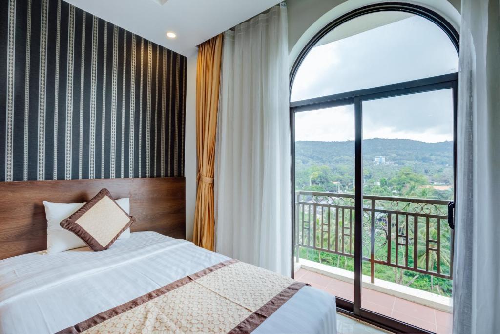 Двухместный (Улучшенный двухместный номер Делюкс с 1 кроватью или 2 отдельными кроватями) отеля Sandy Phu Quoc Hotel, Дуонг-Донг