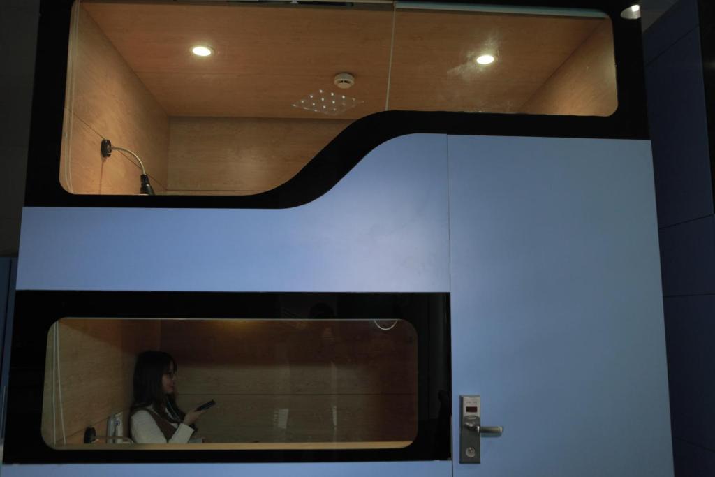 Двухместный (Стандартный двухместный номер с 2 отдельными кроватями) капсульного отеля VATC Sleep Pod Terminal 1, Ханой