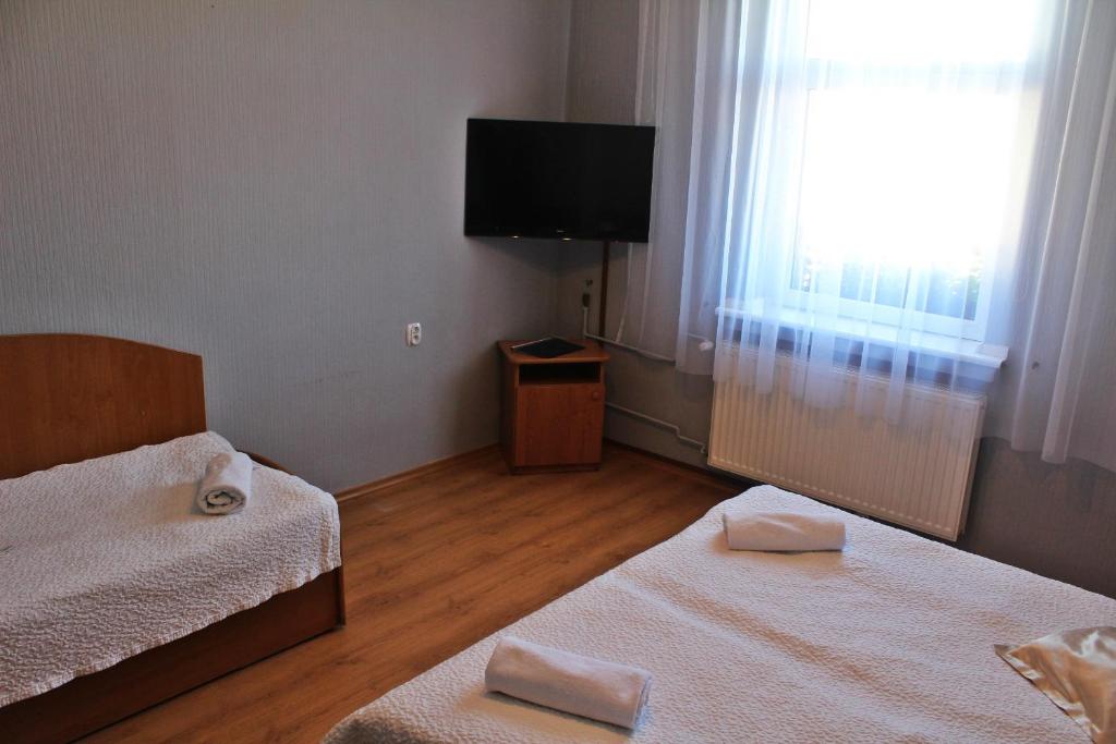 Трехместный (Трехместный номер с основными удобствами) отеля Hotel Bursztyn, Калиш